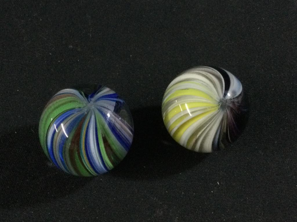 Sam Hogue Marbles: Two exquisite swirl marbles signed & measures 3 3/4" cir. In great condition with no chips or cracks. See pictures.