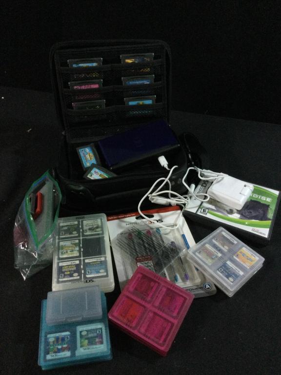 Vintage Nintendo DS w/Games: See pictures, comes with DS system w/charger in carrying bag, 28 games, extra plastic holders for games& new stylus set. All in good condition.