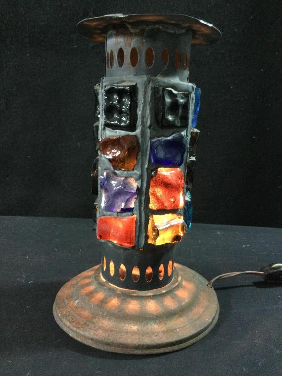 1950s Chunky Glass Mid Century Modern Lamp: Measures 10" h. The black paint is faded & some rust on base in some spots are a few light surface scratches all consistent with age and use. The glass chunks are sturdy and there are no cracks.