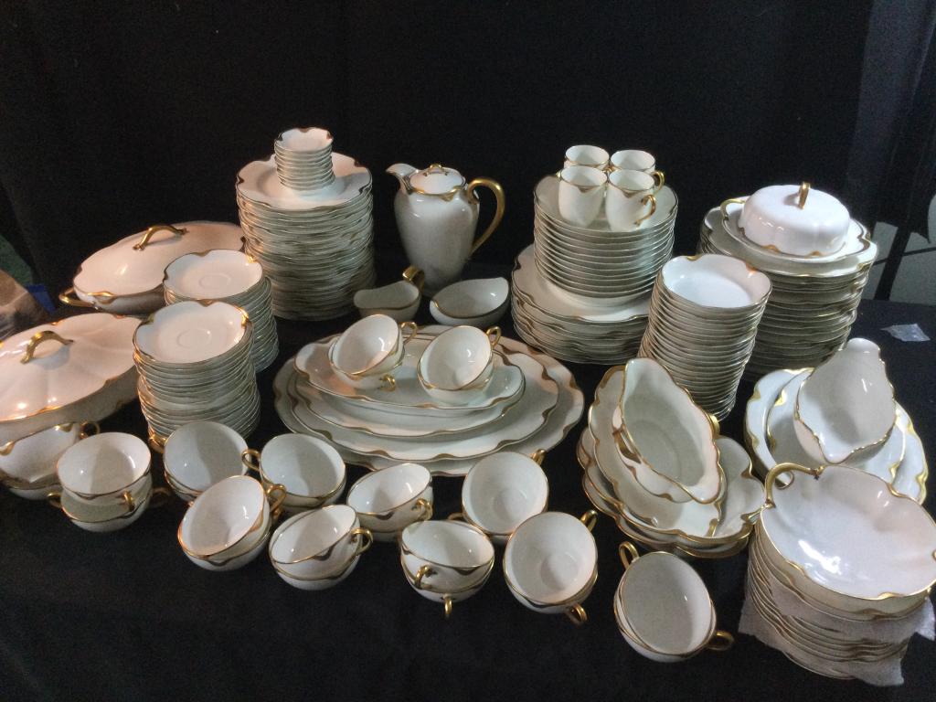 Vintage Haviland Limoge Gold Trim China: Marked Haviland Frances & also Haviland & Co Limoge. Total of 195 pieces in this lot. There is cups, saucers, bowls, plates, gravy boats, salad plates, serving dishes, fruit berry sauce bowls, covered