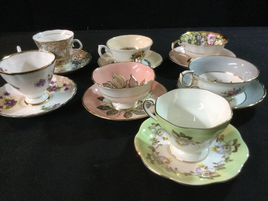 Bone China Tea Cups & Saucers: Total of 7 sets in this lot. They are majority from England with various makers.. Beautiful cups & saucers with vibrant colors. No chips or cracks.