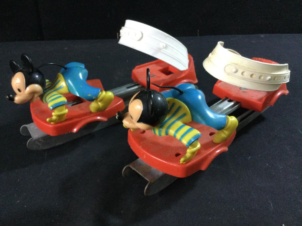 Mickey Mouse Children’s Two blades Ice Skates:: The ankle strap is adjustable. The skates foot size are also adjustable. The foot size can be adjusted between 6” to 8.25”. The skates overall length is 10”. There are a few blemishe
