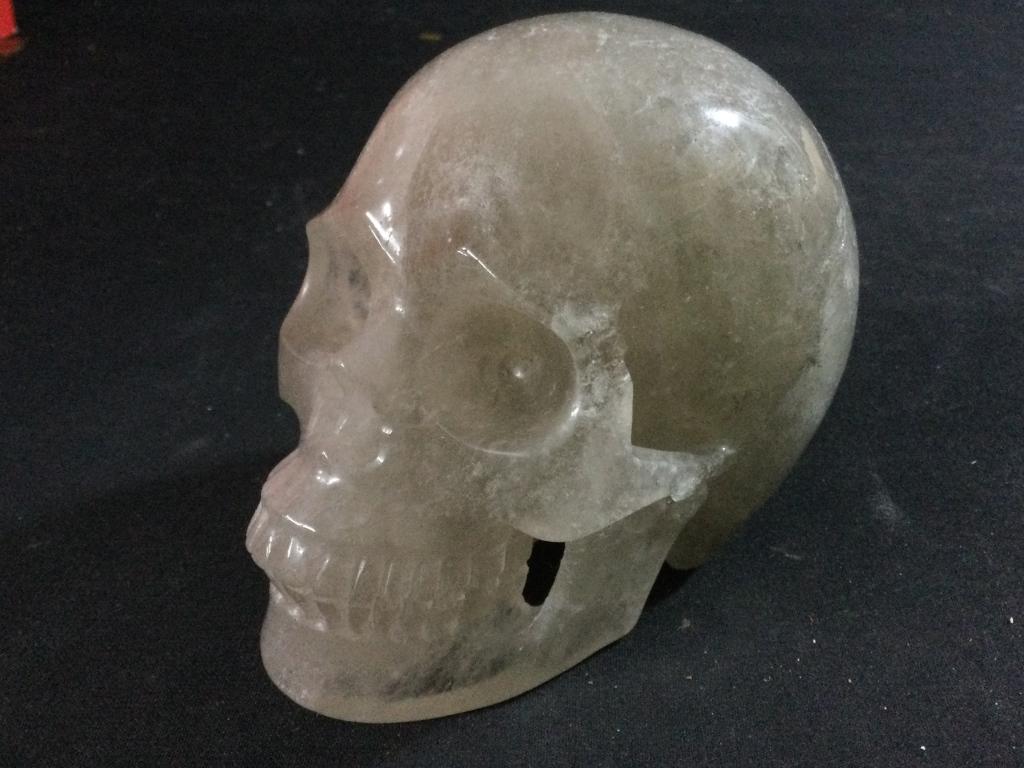 Carved Quartz Skull: Measures 3.5"l x 3"h x 2"w. In good condition with no chips or cracks.