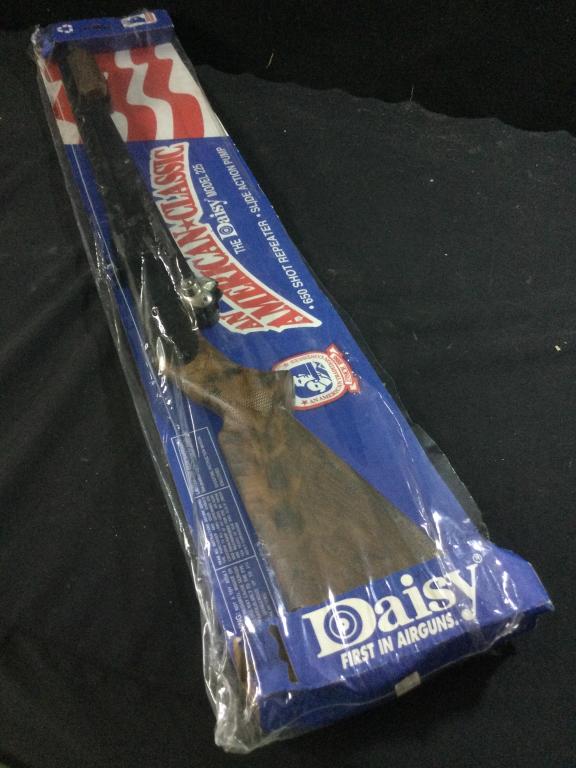 Daisey Model 225 BB Gun: In original packaging. An American Classic The Daisy Model 225 650 shot repeater, slide action pump. In great condition.