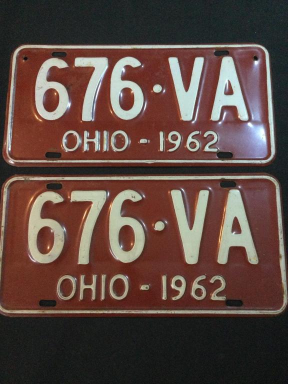 1962 Ohio License Plates: Total of 2 1962 Ohio License Plates. they are red with white letters. In good condition,, with normal wear from use.