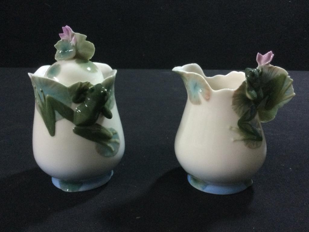 Franz Creamer & Sugar: Nice porcelain Franz with frogs. They measures 4.5"h to 5.5"h. No chips or cracks.