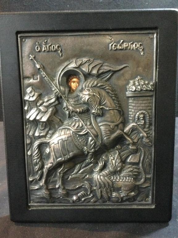 Antique Religious Frame: Silver Greek orthodox Icon. Holy image ma eof pure silver 950 degrees proof. Measures 8.5"h x 6 3/4"w. In good condition. Paper label on back.