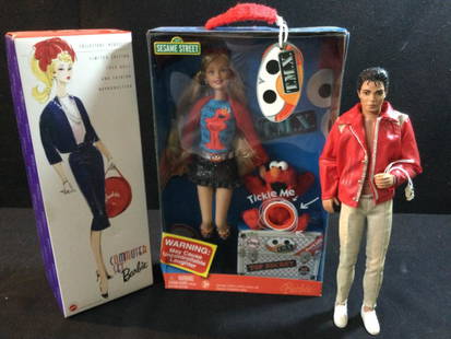 Vintage Dolls: In this lot is a Barbie (Sesame Street), Michael Jackson & Commuter Set Barbie. All in good condition. Michael Jackson is only one not in original box.