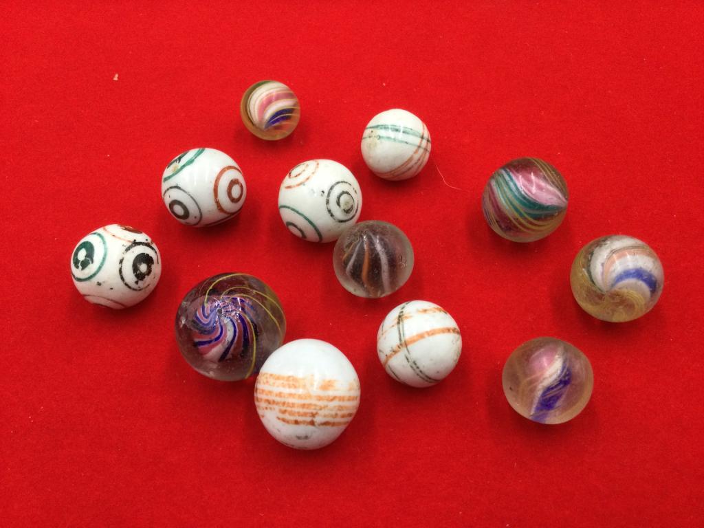 Antique Marbles: Total of 12 early marbles. See pictures. Value 150.00-275.00