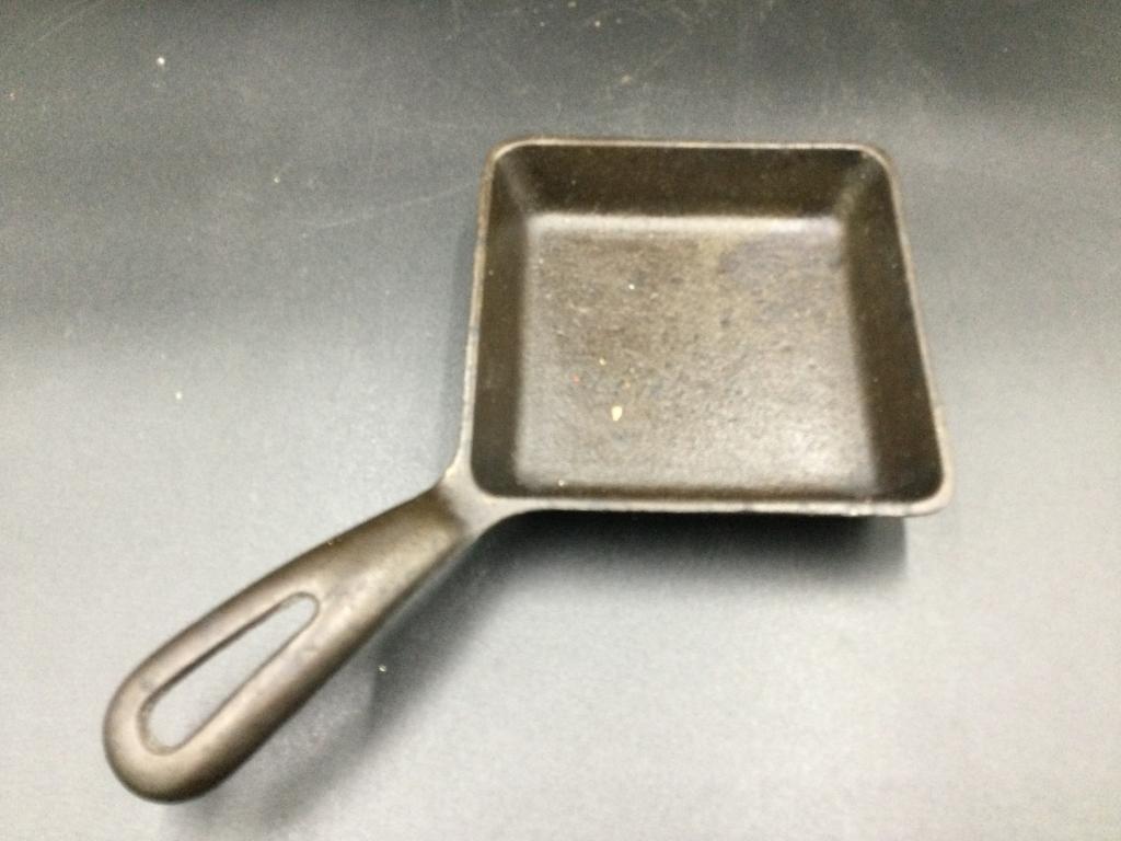 Griswold Square Egg Skillet: Marked on the bottom. In good condition. Measures 9.5"l x 6"w. Value 85.00-100.00