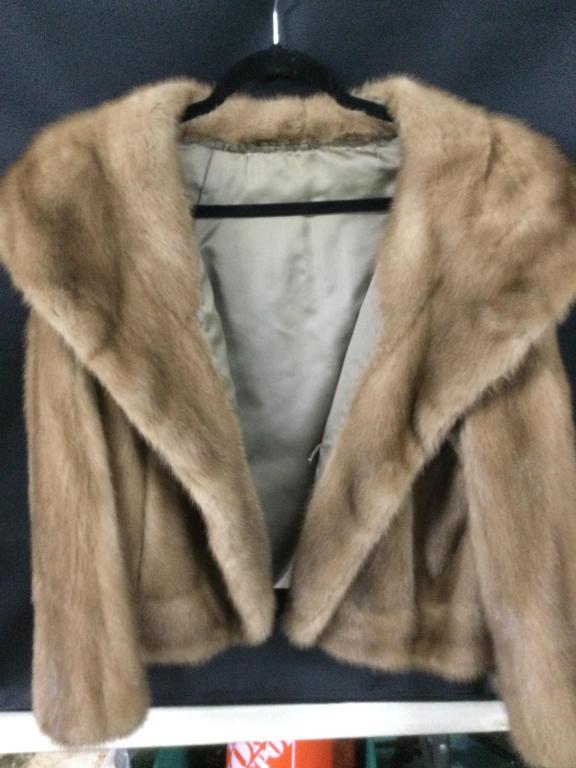 Vintage Mink Jacket: Size Large on this jacket and it is in good condition. Very soft with nice lining with no rips or tears. Value 150.00-300.00