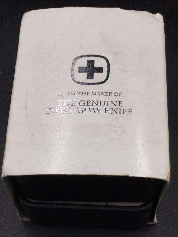 Swiss Military & S.M.T. Design Watch Collections: In original box and sleeve. Neat watch by Wenger and condition is good. Box stated from the maker of the genuine swiss army knife. Value 75.00-100.00