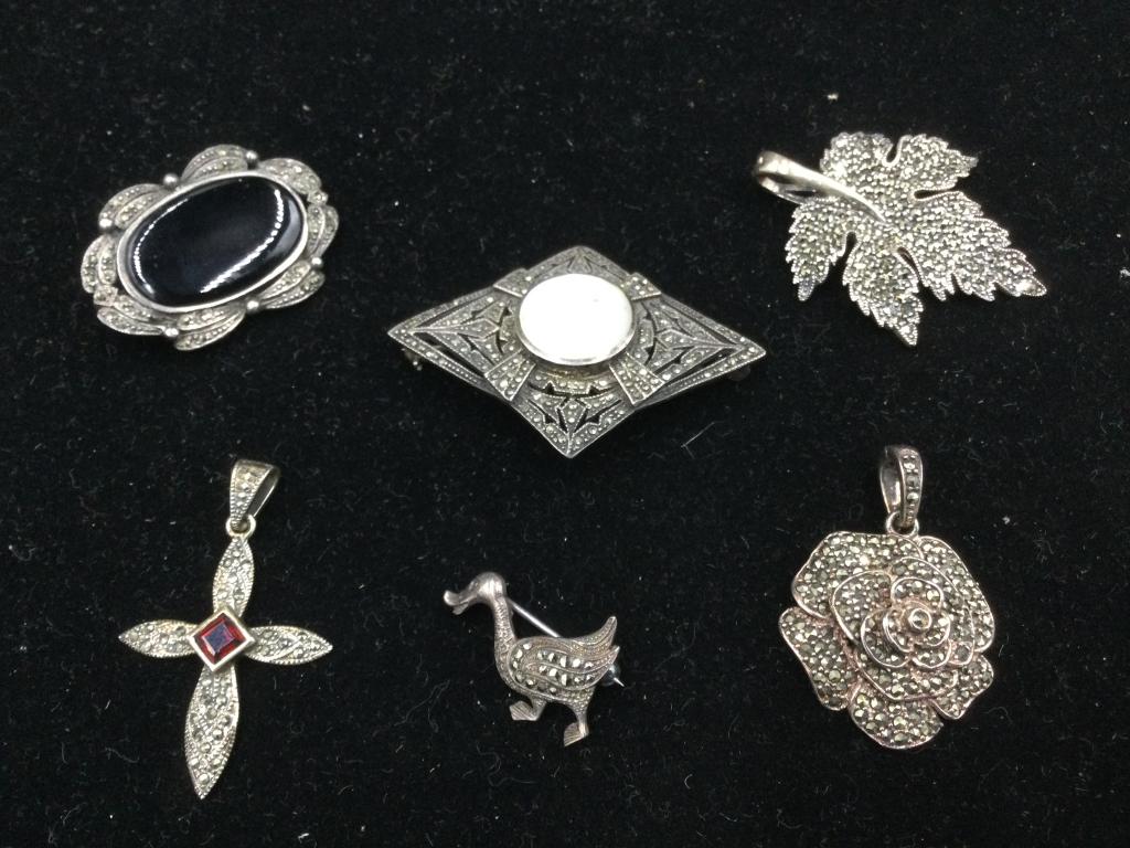 Vintage Sterling Pins/Pendants: 3 beautiful marcasite brooches and 3 pendants. All in great shape. They measure 1" - 2 1/8".. They weigh 54.5 grams.