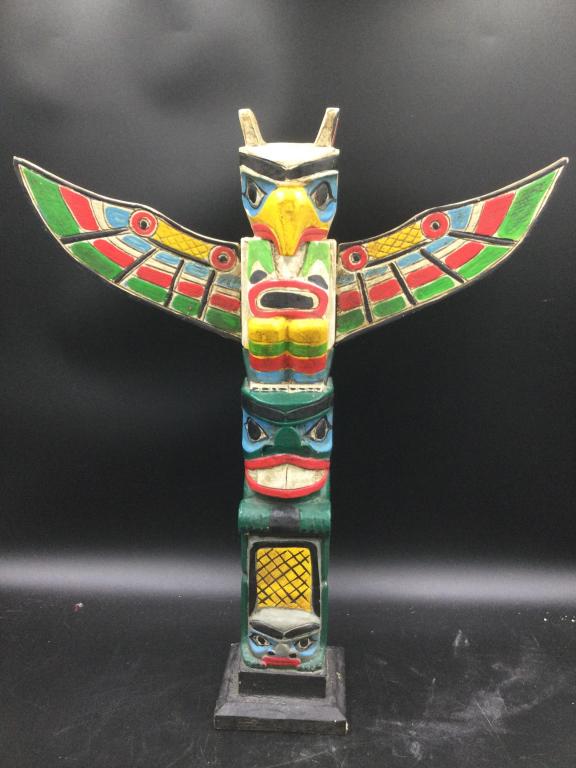 Carved Wood Totem: Carved wood totem with removable wings. This piece measures 20 1/4" tall x 17 1/2" wide and 3".
