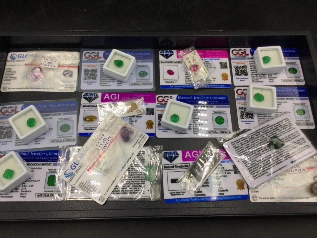 Gemstones: Total of 14 stones in this lot. They have certificate cards. There is emerald, beryl, gahnite, etc.