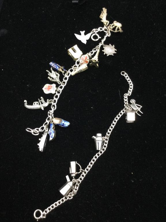 Sterling Charm Bracelets: Two nice charm bracelets. They weigh 40.2g & measure 7" each. Please carefully read our terms of sale, shipping & condition reports prior to bid.