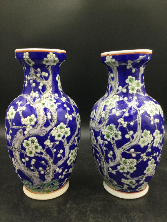 Porcelain Asian Vases: 2 neat Asian vases that measures 1"h and no chips or cracks. See pictures Please note our terms, all sales are final. No refunds will be given under any