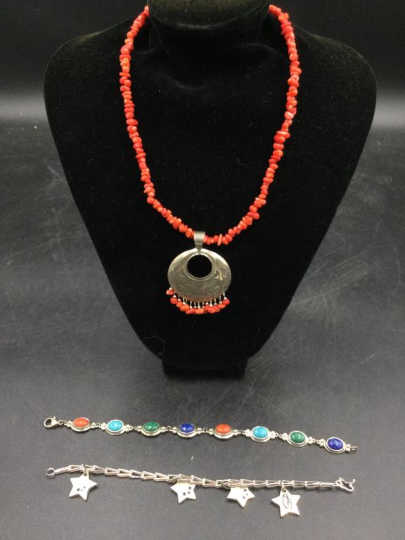 Bead Necklace w/Sterling Pendant: Necklace is a cool piece that has beads and coral. Chain measures 18" and pendant is 1 1/2". Pendant weighs 6.8g. There is also 2 bracelets and they weigh 35.0g. They measures almost 8" each. All in g