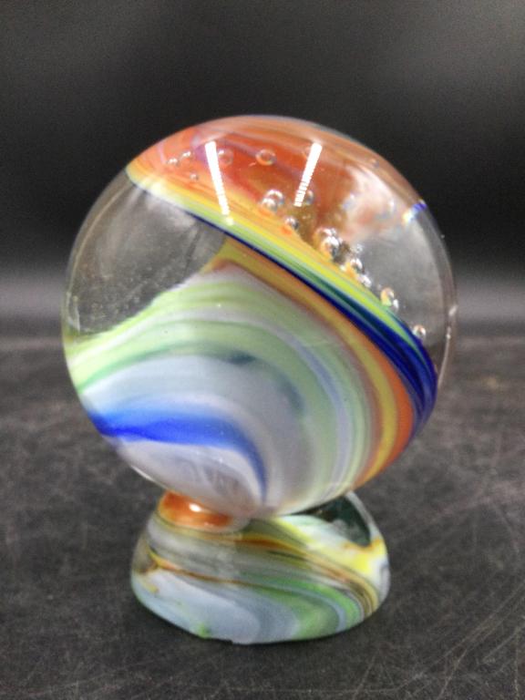 Hogue Signed Marble "Large": Large signed Sunrise swirls of orange, blue, white, etc. Measures 3.04", like the size of a baseball., 77.6mm. No chips or cracks. Has holder for display. Stunning piece. Please read our terms of sale