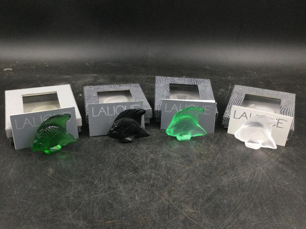 Lalique Fish: Total of 4 in this lot and all have original boxes. They measures 2" and condition is good, see pictures. No refunds given.