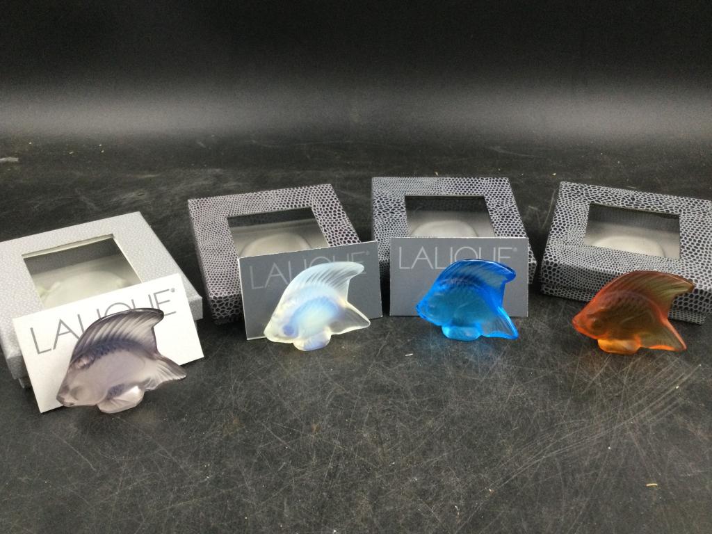 Lalique Fish: Total of 4 in this lot and all have original boxes. They measures 2" and condition is good, see pictures. No refunds given.