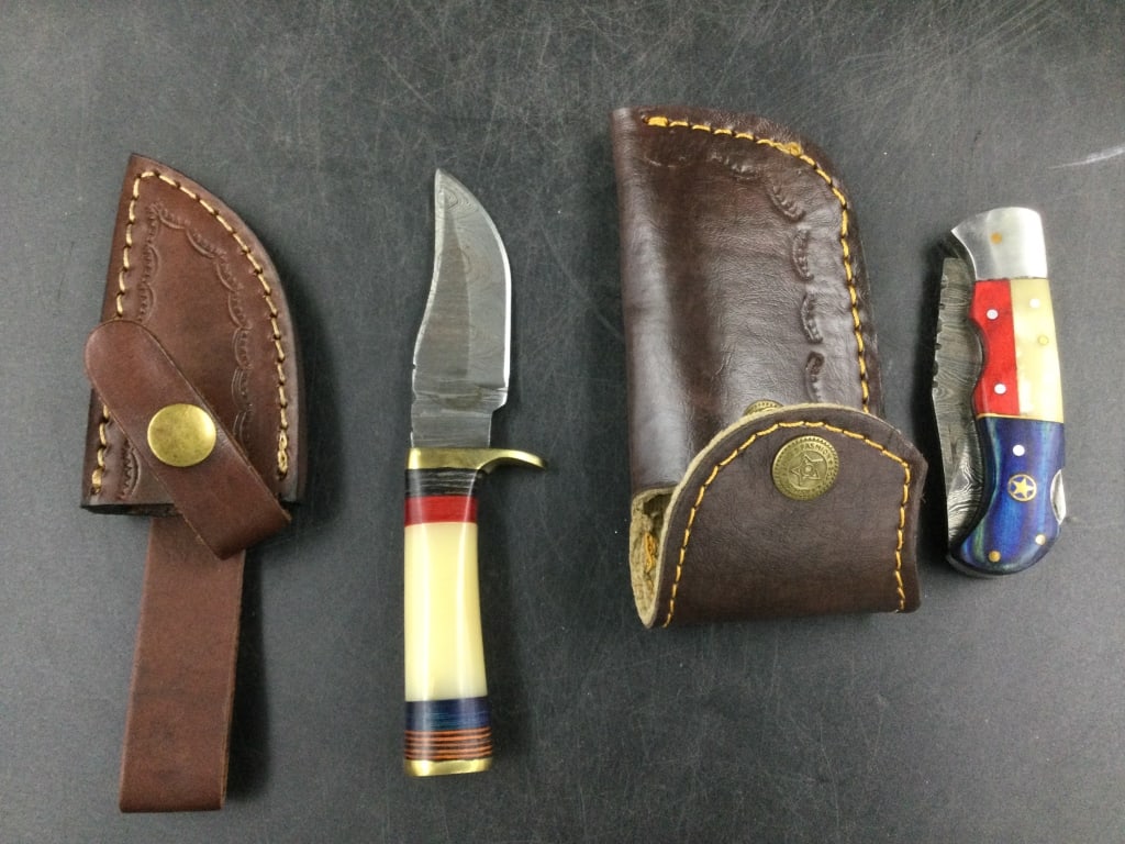 Damascus Steel Knives: Total of 2 knives in this lot. Both come with sheaths and condition is good on both, see pictures. No refunds given.