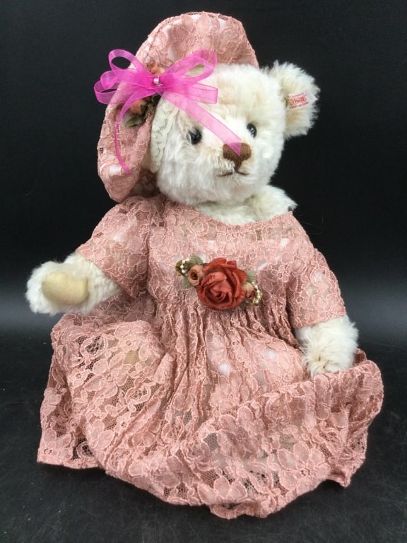 Steiff Bear: Jointed mohair bear that measures 14 1/2'h. Clothes on this bear do not belong but came from estate this way. Condition is good, see pictures. Has tag in ear. No refund given.