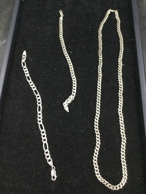 Sterling Chain: Total of 3 pieces. There is a chain and 2 bracelets. Chain measures 22" and bracelets are 7 1/2". Total weight of all is 51.1g. Condition is good, see pictures. No refunds given.