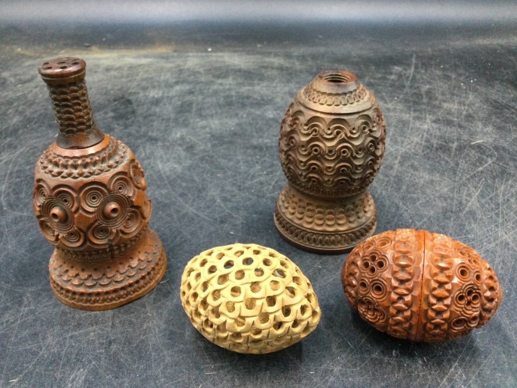 Antique Sewing Eggs: Total of 4 carved pieces. Measures 2" to 4". carved from vegetable ivory. Believe one is a cricket box? Condition is good, see pictures. No refunds given.
