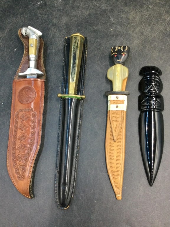 Vintage Knifes: Total of 4 in this lot. One is obsidian and measures 6.5". One knife sheath shows Mexico and knife etched with this also (9"long). The other 2 measures 7.5". Last knife is marked Solingen Germany (9"l