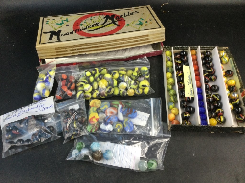 Vintage Marbles: Huge lot of awesome vintage marbles. Various colors and designs, such as Vacor de Mexico, Black Widow, MK Cub Scout, Christensen Flame Rejects, etc. See pictures. Condition is consistent with age and