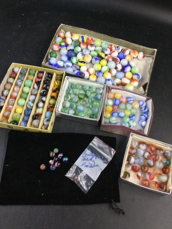 Vintage Marbles: Huge awesome lot of various marbles with a variety of colors. See pictures. Condition is consistent with age and use. No refunds given.