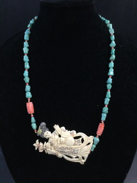 Vintage Necklace with Turquoise and Coral: There is a carved lady in this necklace. She measures 3.5" x 2" and is hand painted and scrimshaw. Exquisite piece, see pictures. No refunds given.