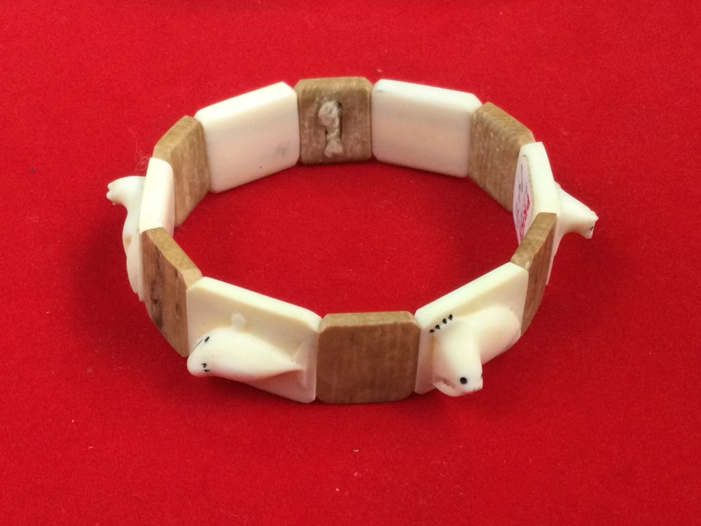 Vintage Mammoth Bracelet: Nice piece, see pictures. There is seals carved, condition is good, see pictures. No refunds given.