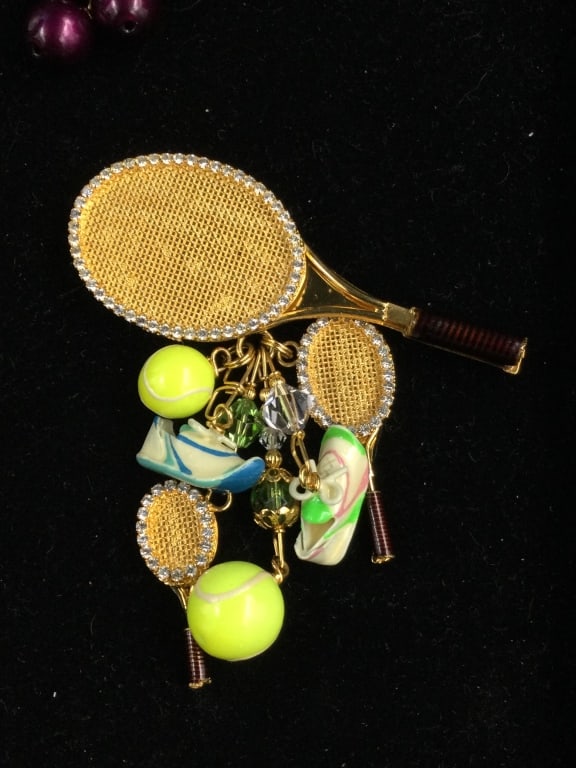 Lunch at Ritz Pin/Pendant: This piece is a Tennis theme. There is a racket, shoes, ball and gemstones. See pictures, condition is good. No refunds given.