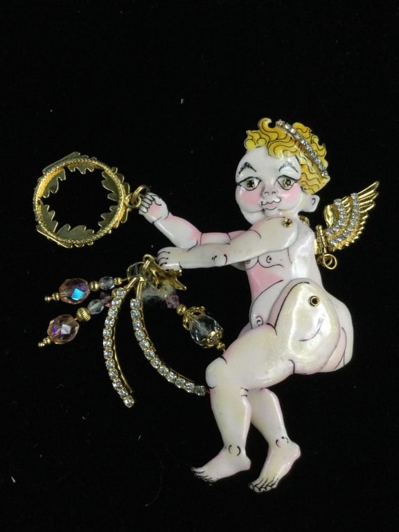 Lunch at Ritz Pin/Pendant "I'm No Angel": Beautiful cupid that has articulating parts. Condition is good, see pictures. Measures 4 1/4" No refunds given.