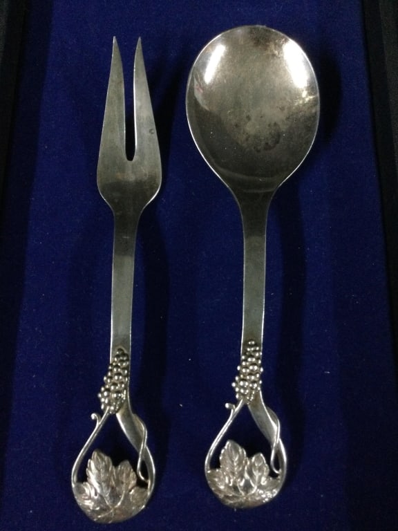 Frank Whiting & Co Sterling Handmade Sterling: Neat large solid sterling Frank Whiting Grape Motif Serving Spoon and Meat Fork. Total weight is 179.6g. Condition is good, see pictures. They measures about 9" each. No refunds given.