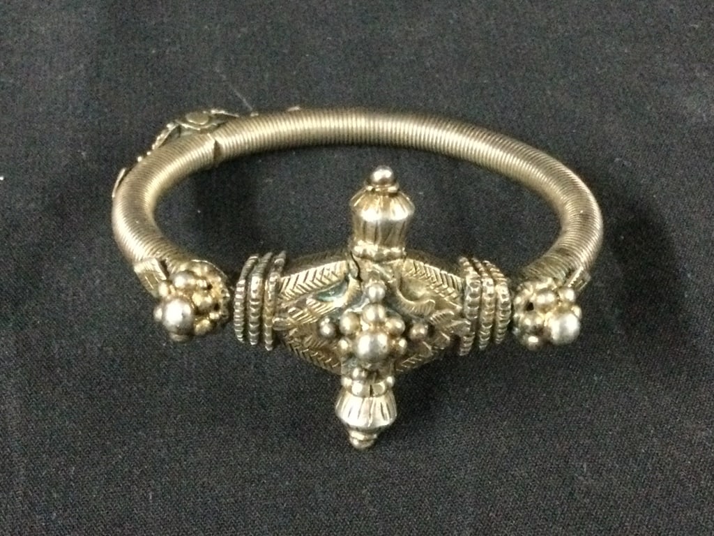 Vintage Bangle Bracelet: Solid silver mid eastern bracelet. screw pin to open up bracelet. See pictures. Condition is consistent with age and use. No refunds given.