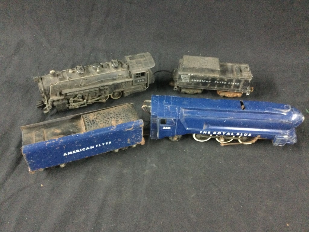 Vintage American Flyer Trains: There is 2 engines with attached car. Condition is consistent with age and use, see pictures. No refunds given.