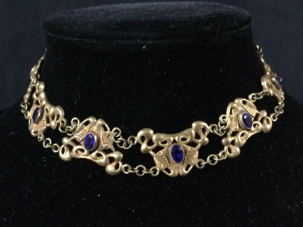 Antique Singh Goldstone & Blue Austrian Crystal: Condition is good, see pictures. Sport a glistening spot of positively aristocratic shine around your neck with goldtone glow of this crystal encrusted choker. No refunds given.