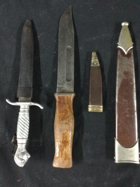 Vintage Knives: One is US Camillus NY and the other is Gutmann Cutlery Solingen Germany. Also in lot is 2 German Dagger Sheaths. Condition is consistent with age and use on both. See pictures. No refunds given.