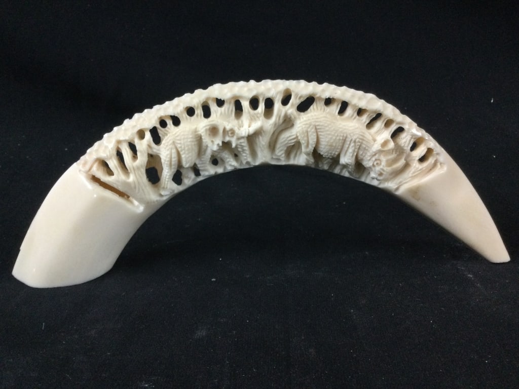 Carved Tooth: Measures 12" and is a great piece. Carved elephant and hippo on both sides. Condition is good, see pictures. No refunds given.