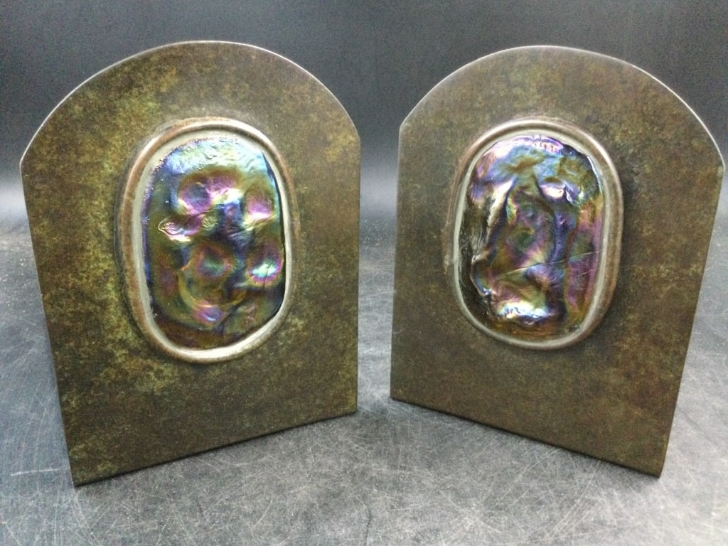Tiffany Studios New York Bookends: Nice larger bookends that measures 8" x 6" x 8". They have favrile glass on front of each bookend. Condition is good, see pictrues. No refunds given.
