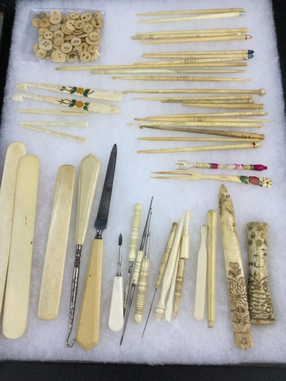Misc Lot of Carved Bone Items Etc: Cool lot that has carved pieces such as buttons, sewing hooks, tools,letter openers, etc. See pictures, condition is consistent with age and use. No refunds given.