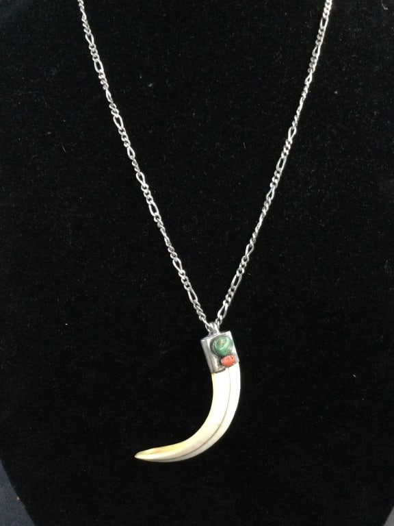 Navajo Sterling Chain with Pendant: Nice long chain 23" with pendant. Pendant is a pig tusk with silver cap and turquoise and coral on the cap. Measures 3.5". See pictures. No refunds given.