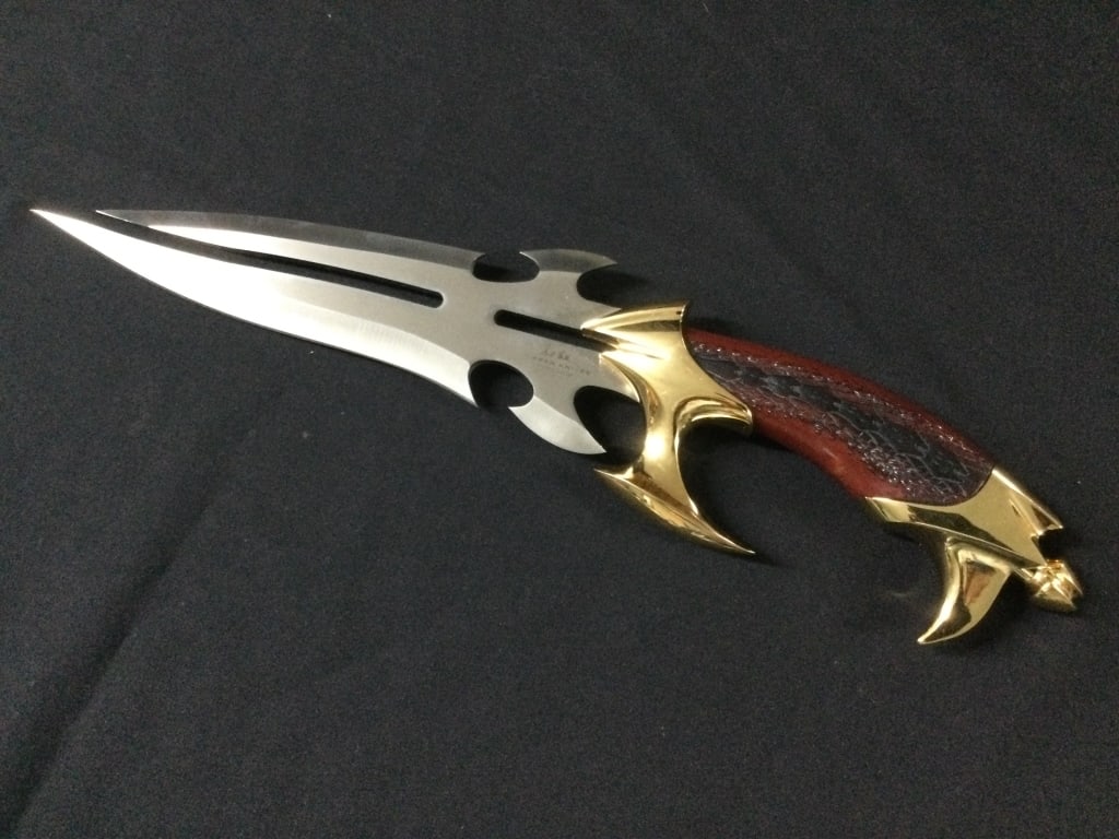 Hibben Knive: 1999 Gold Edition and signed. Measures 15"l and condition is good, see pictures. No refunds given.