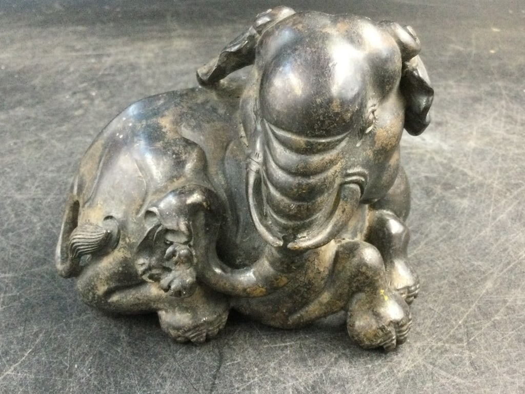 Bronze Asian Elephant: Nice heavy piece that is a bronze elephant seating down. Measures 3" x 4" x 2.5". Condition is good, see pictures. No refunds given.