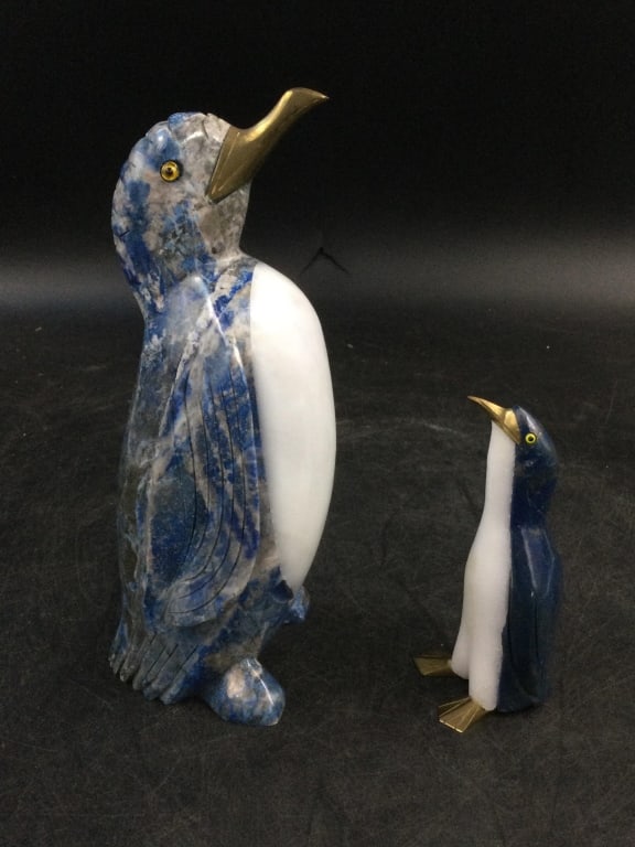Lapis Lazuli Penquins: Handcrafted beauty carved from natural lapis lazuli stone. The taller one 8 1/4" has a sticker on bottom from Chile . The smaller one is 4.5". Condition is good, see pictures. No refunds given. Intern
