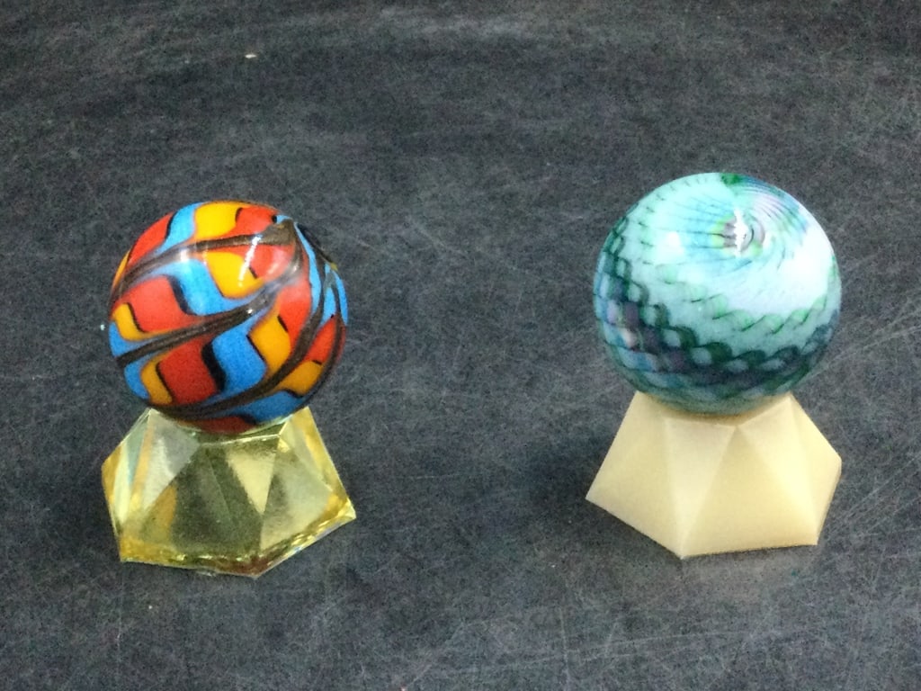 Handmade Art Glass Marbles: Very nice marbles. One is a Superman style 1.511 and the other Contemporary 1.589. Both have stands and condition is good. See pictures. No refunds given