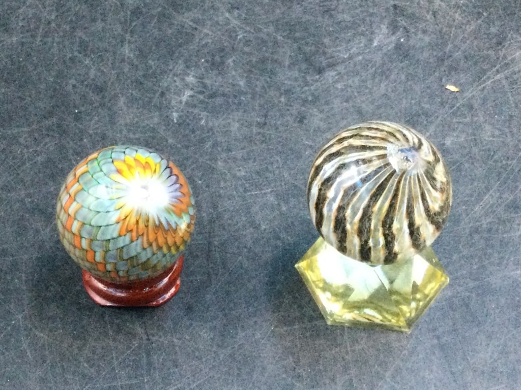 Handmade Art Glass Marbles: There is two in this lot. One is a latticino pattern 1.533"and the other is striped round horn bowl 1.543". Condition is good, no chips or cracks. See pictures. No refunds given.